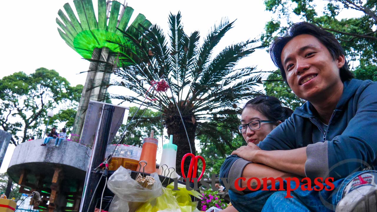 Young students at the sausage stand, Ho Con Rua, Saigon